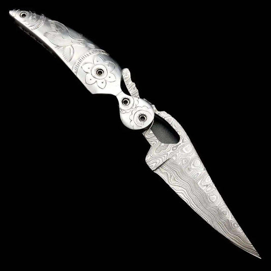 Handcrafted Damascus Steel Folding Knife – Ornate Engraved Handle