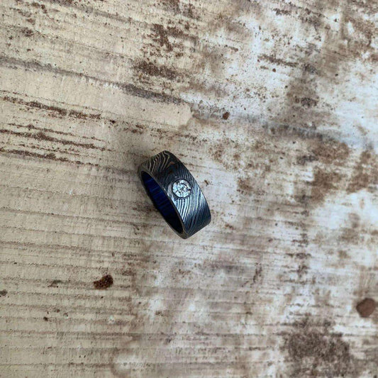 Handcrafted Damascus Steel Ring with a Blue Interior and Diamond Inlay