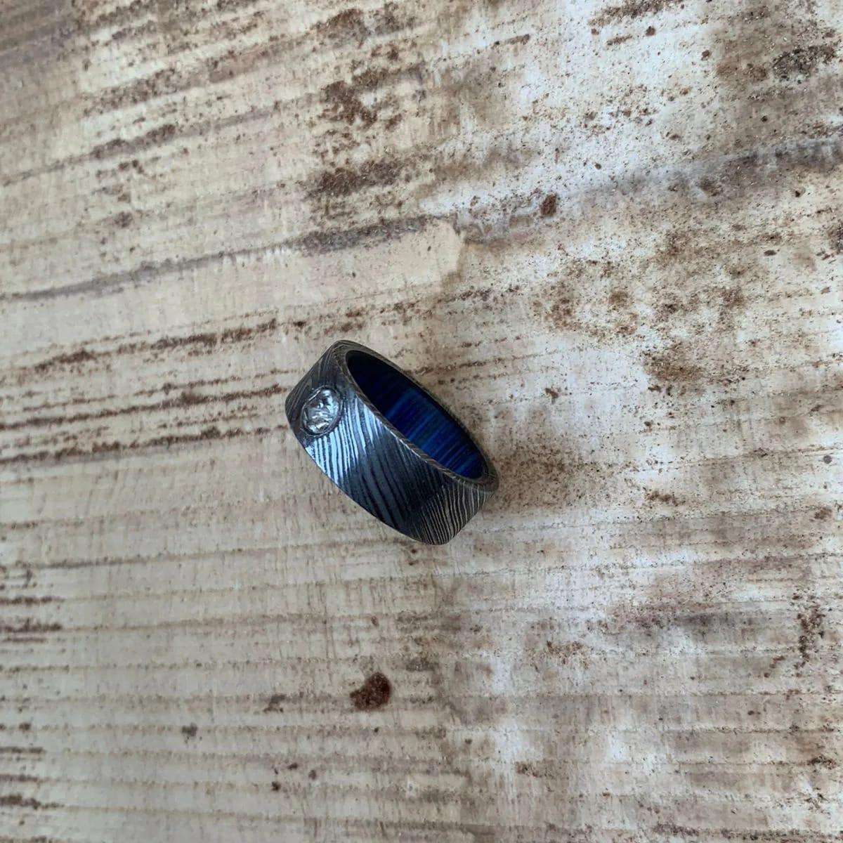 Handcrafted Damascus Steel Ring with a Blue Interior and Diamond Inlay