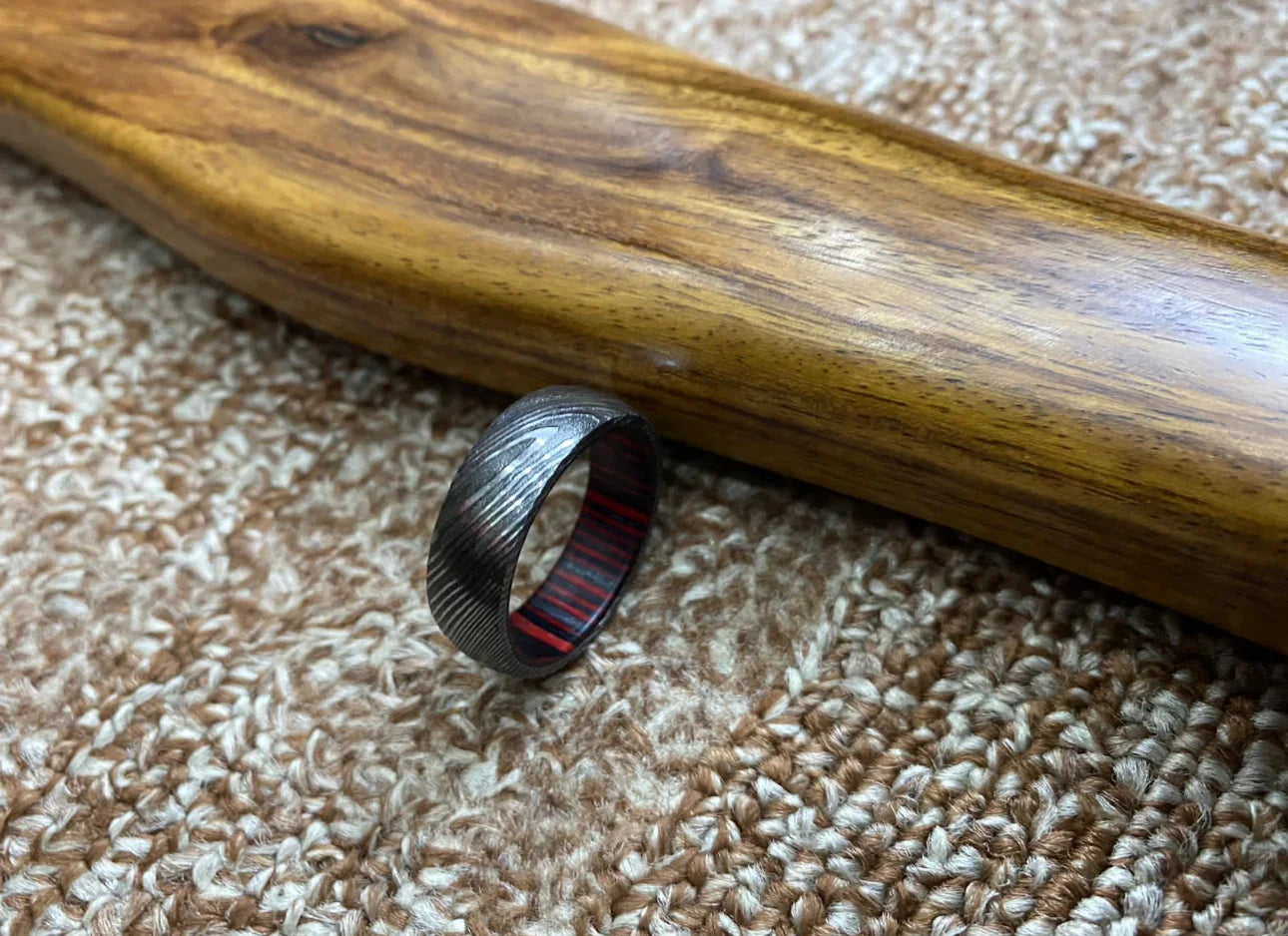 Handmade Damascus Steel Ring with Red Paka Wood Interior